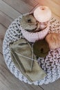 various balls of yarn, sitting on a wooden floor next to a basket of knitting Royalty Free Stock Photo