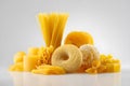 Assortment of uncooked pasta varieties arranged artfully on a smooth surface Royalty Free Stock Photo