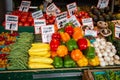 Array of fresh produce on display for purchase at a local farmers' market