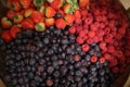 Array of fresh strawberries, blueberries, and raspberries Royalty Free Stock Photo