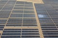 Array of industrial solar panels installed in desert terrain Royalty Free Stock Photo