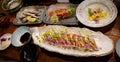 An array of Japanese grilled seafood dishes.