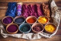 an array of natural dyes on wooden surface