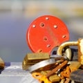 many padlocks and keys in different colors next to each other