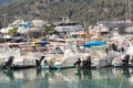 An array of several sail boats, and yachts, at a harbor, in Majorca, Spain.