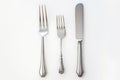 Elegant Silver Cutlery Set on White Background Royalty Free Stock Photo