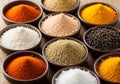 An array of small bowls, each containing a different spice or Royalty Free Stock Photo