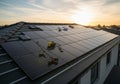 Array of solar panels on a residential rooftop at sunset. Various Royalty Free Stock Photo