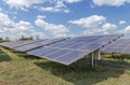 Array of thin film solar cells or amorphous silicon solar cells in solar power plant turn up skyward absorb the sunlight from the