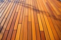 an array of variously finished teak deck pieces Royalty Free Stock Photo