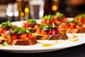 an array of vibrant bruschetta with pickled carrots