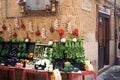 various vegetables and fruits for sale on display in an alleyway