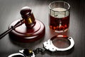 Arrest Crime and violence concept with handcuffs. judge gavel, handcuffs and soundboard. legislation legal concept. Alcoholism Royalty Free Stock Photo