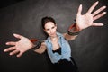 Arrest. Criminal woman prisoner showing handcuffs Royalty Free Stock Photo