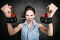 Arrest. Criminal woman prisoner showing handcuffs Royalty Free Stock Photo