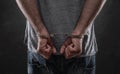 Arrested criminal with handcuffs on