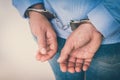 Arrested woman in handcuffs with hands behind back Royalty Free Stock Photo