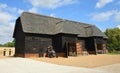 Beautiful Old Thatched Barn with doors open Royalty Free Stock Photo