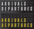 Arrival and departures sign on airport board Royalty Free Stock Photo