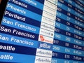 Arrival display board at airport terminal Royalty Free Stock Photo