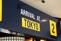 arrival in Tokyo inscription on the sign at the airport Royalty Free Stock Photo