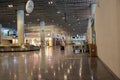 Bodrum, Turkey - August, 2020: Arrivals hall with glittering store windows of Duty Free stores at Bodrum airport