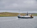 Arriving at Lerwick harbour, the Defiant LK 371, a whitefish trawler built in 1987 Royalty Free Stock Photo