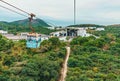 Arriving at Ngong Ping 360 Skyrail upper station on Lantau Island in Hong Kong. Worlds most amazing cable car experience. Out of Royalty Free Stock Photo