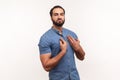 Arrogant egoistic bearded man drawing attention to itself, bragging with strength and endure, successful famous person posing at Royalty Free Stock Photo