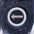 Arrow button on a pole