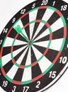 Arrow dart hitting the center of the target dart Board Royalty Free Stock Photo