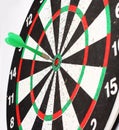 Arrow dart hitting the center of the target dart Board Royalty Free Stock Photo