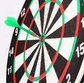 Arrow dart hitting the center of the target dart Board Royalty Free Stock Photo