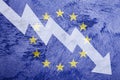 Arrow down on the background of the EU flag. The concept of economic recession, depression and crisis.