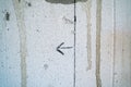 An arrow drawn with a pencil on a gas block wall close-up. The line drawn on the wall of aerated concrete bricks for builders.