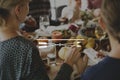 Arrow icon on people having dinner Royalty Free Stock Photo
