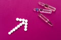 The arrow is lined with tablets and ampoules for injections. Royalty Free Stock Photo