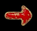 Arrow made in golden shining metallic 3D with red paint isolated on black background. 3d Royalty Free Stock Photo