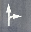 Arrow painted on asphalt Royalty Free Stock Photo