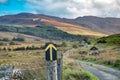 Arrow pointing the way to the Bluestack Mountains between Glenties and Ballybofey in County Donegal - Ireland Royalty Free Stock Photo