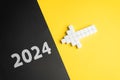 The arrow points to 2024. The beginning of a new year.