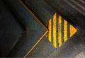 Arrow shaped yellow stairs bokeh background Royalty Free Stock Photo