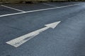 Arrow sign on asphalt surface Royalty Free Stock Photo