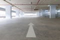 Arrow sign in Parking garage interior industrial building Royalty Free Stock Photo