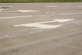 Arrow signs as road markings on a street, double arrows Royalty Free Stock Photo