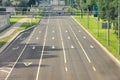 Arrow signs as road markings on a street with five lanes. Dedicated lane for public transport, buses Royalty Free Stock Photo