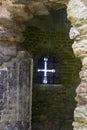 An Arrow Slit in the wall of the 13th century Titchfield Abbey in Hampshire England that was home to a monastic community many cen