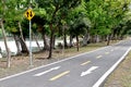 Arrow symbol on lenses in the park with traffic sign