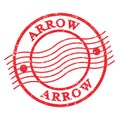 ARROW, text written on red postal stamp