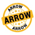 ARROW text written on yellow-black stamp sign